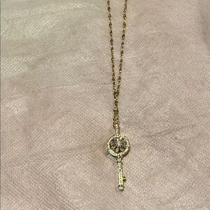 Radiant Gold Key Pendant Necklace